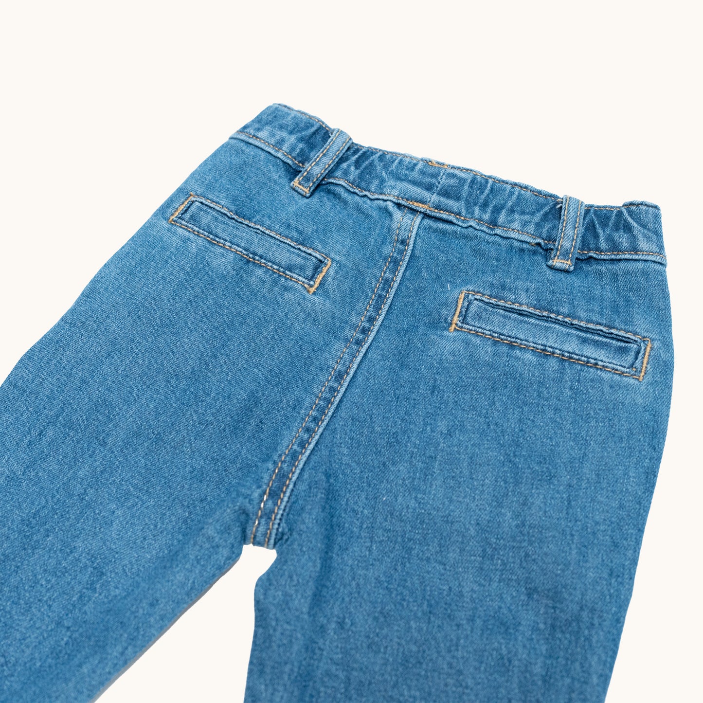 EVERYDAY DENIM JEANS; 100% Organic Cotton; Soft stretch denim with mock zip fly; Five-pocket style; Adjustable elasticated waist with belt loops; Folded cuffs allow for adjustable length of jeans.