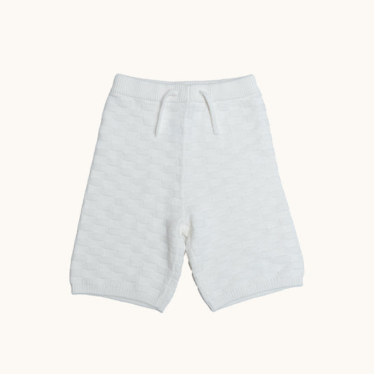 KNITTED BERMUDA SHORTS - CREAM; 100% Organic Cotton; Shorts made from GOTS-certified organic cotton; Elasticated waistband; Relaxed fit.