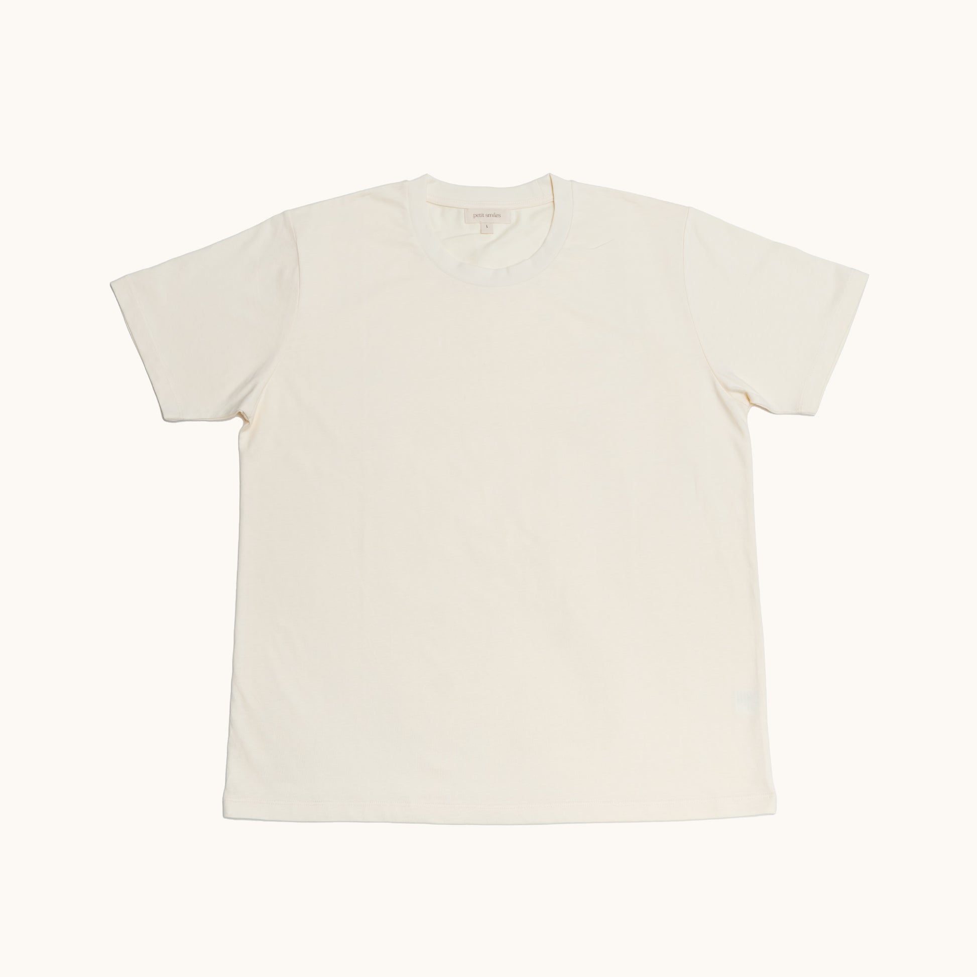 ADULT ORGANIC COTTON TEE; Made from 100% Organic Cotton; GOTS, Organic, certified by CUC-03-03149773; Warm and cozy in Milk colour; Rib band at neck edge; Relaxed fit