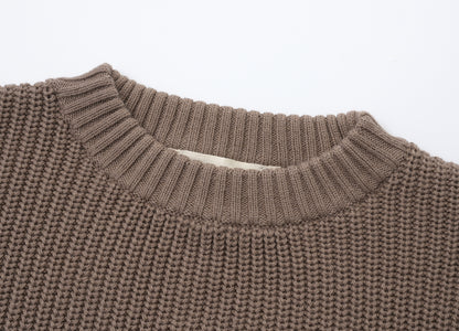 KNITTED PURE PULL OVER - CHOCO; 100% Organic Cotton; Pull Over made from GOTS-certified organic cotton; Rib finish at neck, cuffs and hem; Dropped shoulder; Relaxed fit.