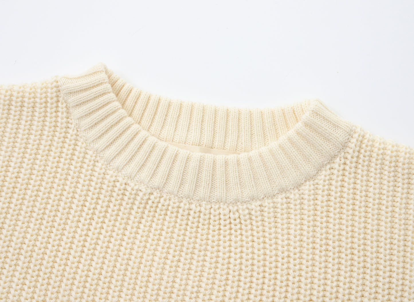KNITTED PURE PULL OVER - CREAM; 100% Organic Cotton; Pull Over made from GOTS-certified organic cotton; Rib finish at neck, cuffs and hem; Dropped shoulder; Relaxed fit.