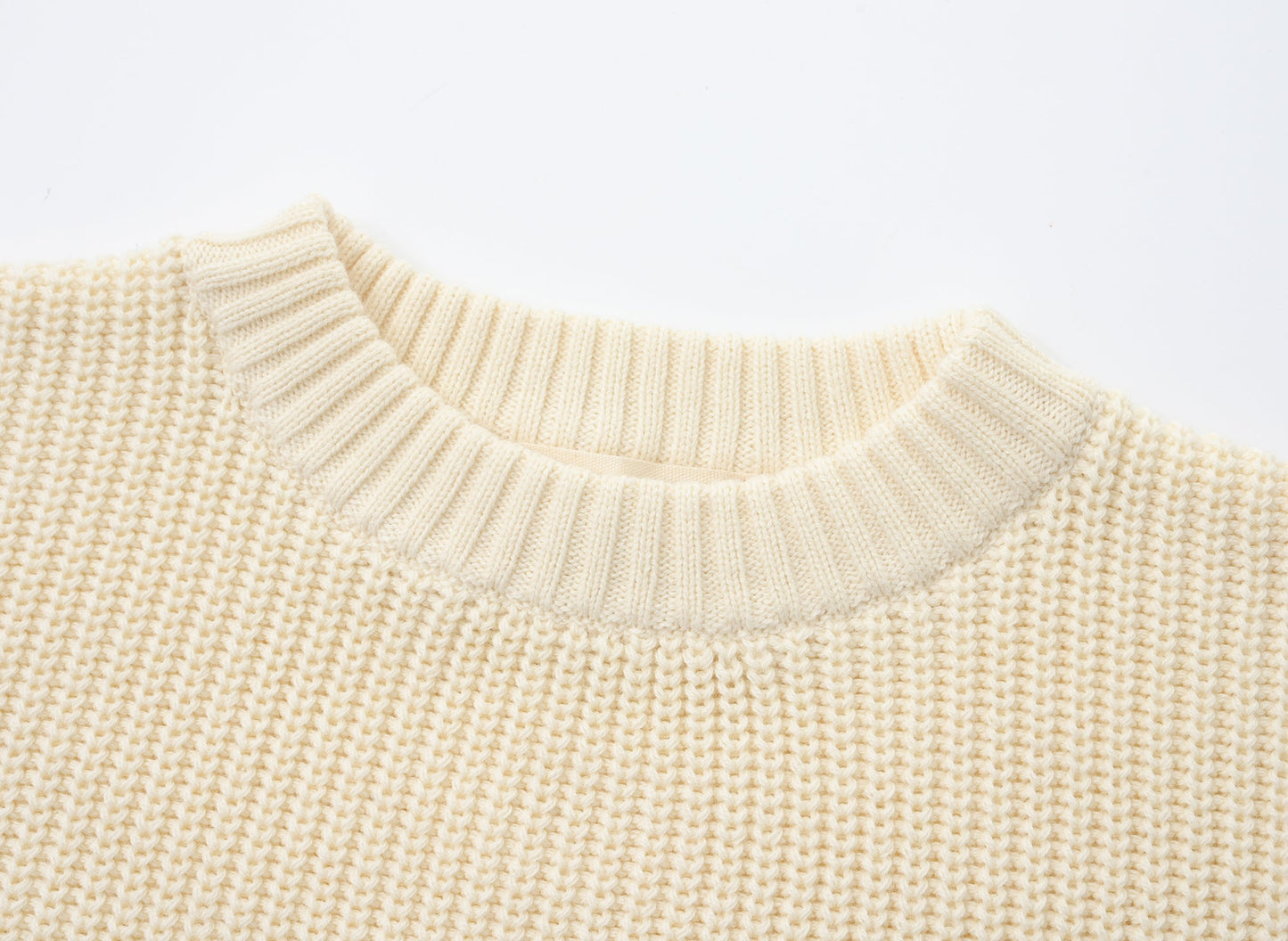 KNITTED CREAM PULL OVER WITH CHOCO SINGLESUIT; 100% Organic Cotton; Pull Over made from GOTS-certified organic cotton; Rib finish at neck, cuffs and hem; Dropped shoulder; Relaxed fit.