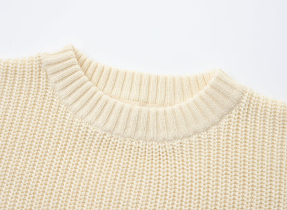 KNITTED CREAM PULL OVER WITH CHOCO SINGLESUIT; 100% Organic Cotton; Pull Over made from GOTS-certified organic cotton; Rib finish at neck, cuffs and hem; Dropped shoulder; Relaxed fit.