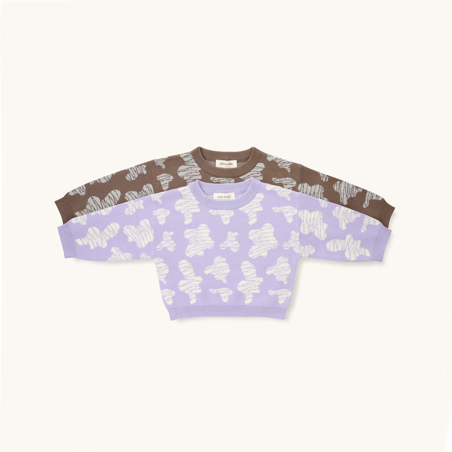 KNITTED SPOTS PULL OVER - TARO; 100% Organic Cotton; Jacquard Pull Over made from GOTS-certified organic cotton; 'Taro Spots' Jacquard pattern; Rib finish at neck, cuffs and hem; Dropped shoulder; Relaxed fit.